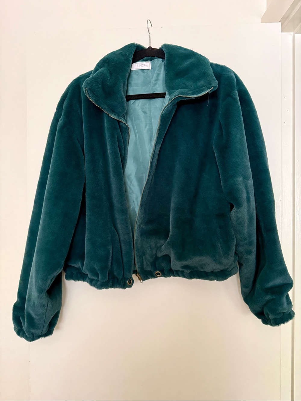 Faux fur teal bomber-style jacket